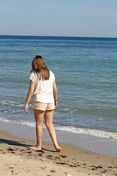 teenage girl on a beach