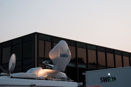 STUTTGART, GERMANY - JULY 25: SWR, the Southwest German Radio&TV Corporation is recording and broadcasting the premiere of Mozart´s opera “Don Giovanni” on TV and on a large screen for the public viewing in front of the Opera building in Stuttgart, Germany on July 25, 2012.