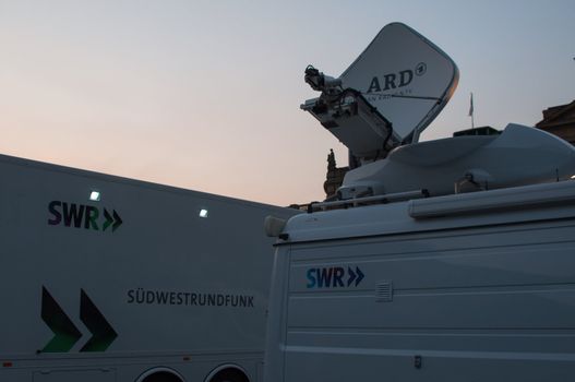 STUTTGART, GERMANY - JULY 25: SWR, the Southwest German Radio&TV Corporation is recording and broadcasting the premiere of Mozart´s opera “Don Giovanni” on TV and on a large screen for the public viewing in front of the Opera building in Stuttgart, Germany on July 25, 2012.