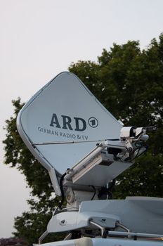 STUTTGART, GERMANY - JULY 25: SWR, the Southwest German Radio&TV Corporation is recording and broadcasting the premiere of Mozart´s opera “Don Giovanni” on TV and on a large screen for the public viewing in front of the Opera building in Stuttgart, Germany on July 25, 2012.