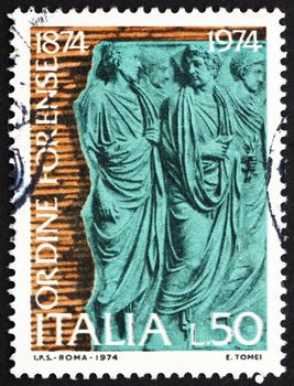 ITALY - CIRCA 1974: a stamp printed in the Italy shows Bas-relief from Ara Pacis, Centenary of the Ordini Forensi, circa 1974