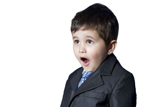 Surprised businessman child in suit with funny face