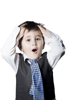 Child dressed like businessman with hands on his head surprised