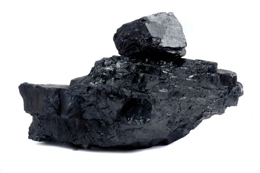 a big and small lump of coal isolated on white background