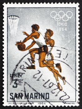 SAN MARINO - CIRCA 1964: a stamp printed in the San Marino shows Basketball, 18th Olympic Games, Tokyo, circa 1964