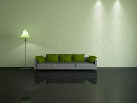 Grey sofa with green pillows near a wall
