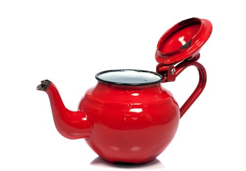 old metal red tea pot isolated on white