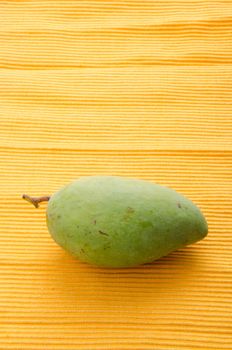 mango. green mango with background.