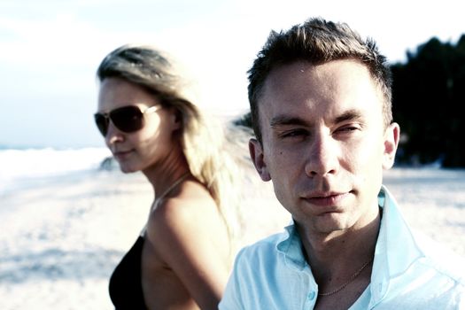 girl and boy on ocean beach