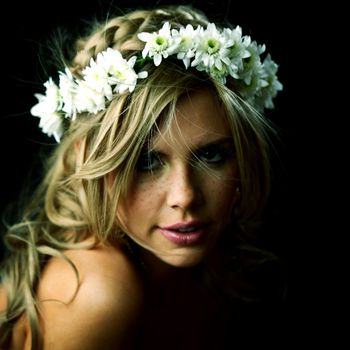 young women on black flowers in hair