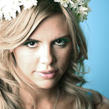 young women on blue flowers in hair