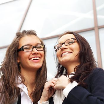 very funny laughing happy girlfriends close up