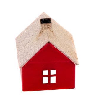 Red toy house with window isolated on white background.