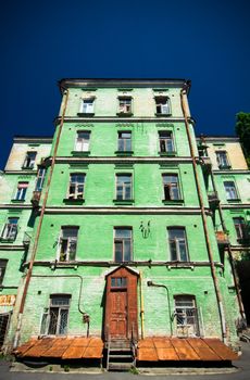 Old painted  brick house with open windows, Kyiv, Ukraine