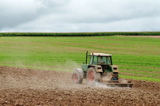 a tractor at work in a field