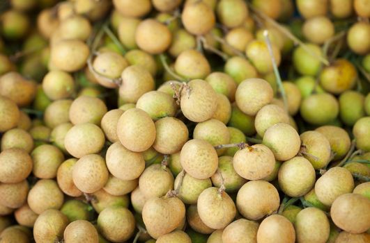 Longan fruit close-up on the counter of the Asian market - Thailand