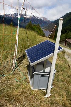 solar panel powered electric shepherd in the Swiss Alps