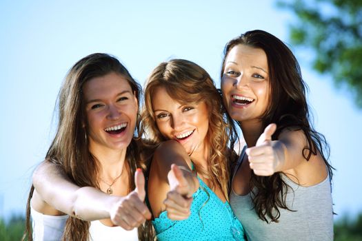 summer girlfriends in sun ligt happy and smile