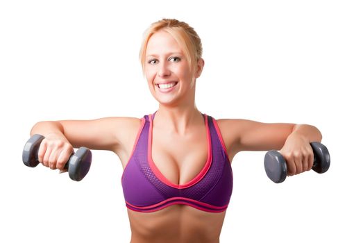 Woman working out with dumbbells at a gym