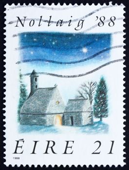 IRELAND - CIRCA 1988: a stamp printed in the Ireland shows St. Kevin's Church, Glendalough, Christmas, circa 1988