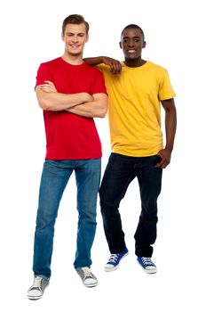 Full length portrait of casual young dudes posing in style