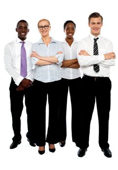 Young attractive business people. Arms folded. Full length portrait