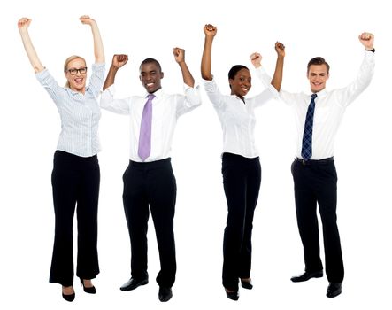 Full length portrait of happy successful business group over white background