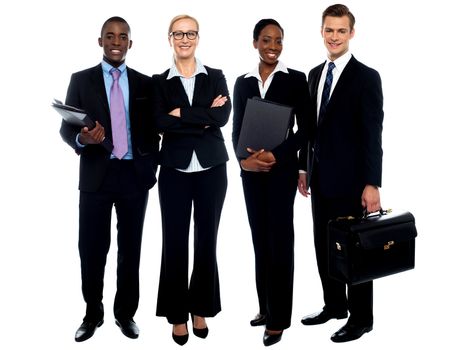 Happy smiling business team standing in a row isolated over white