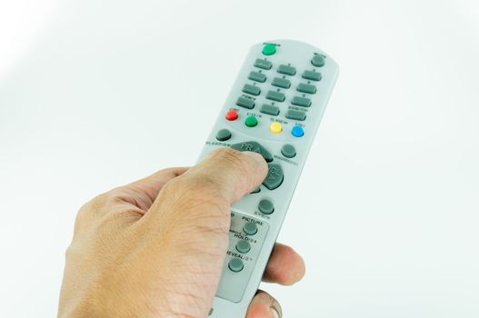 Hand holding remote control on isolate white background