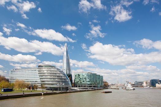 London City Hall Skylines along River Thames against blue sky, England UK