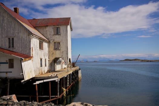 Old fishing port by the fjord on Lofoten islands in Norway