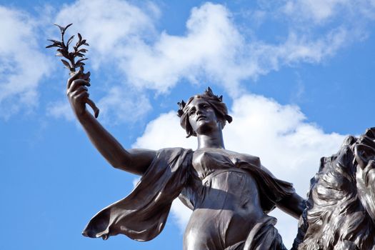 Close up  Angel of Justice one of Victoria Memorial statues at buckingham palace, London, UK