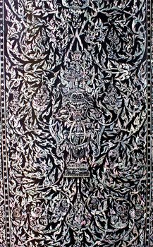 Stock Photo - Thai art made from pearl on the door of Rarchabophit temple Thailand.