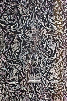 Stock Photo - Thai art made from pearl on the door of Rarchabophit temple Thailand.