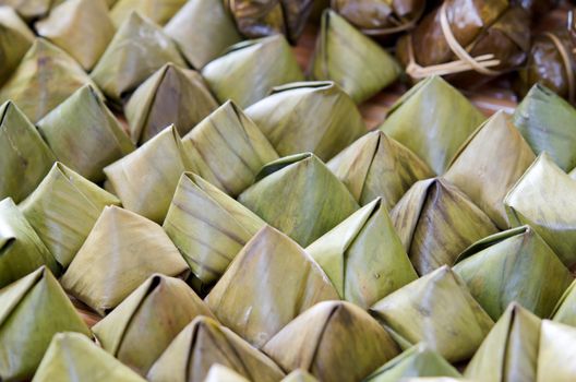 Sweet sticky rice in banana leaf package