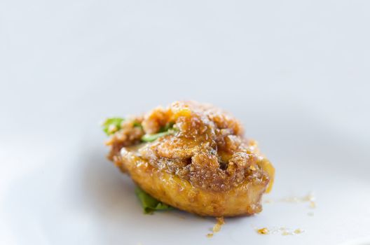 closeup boiled egg fried with tamarind sauce 