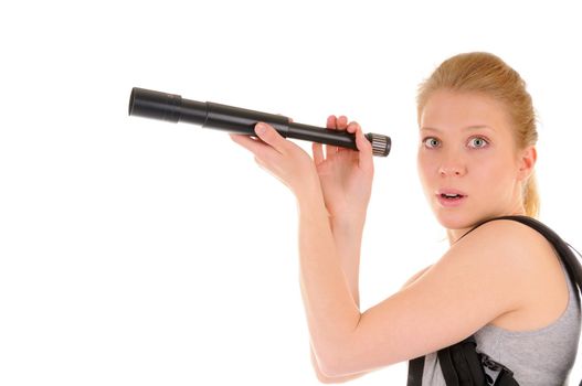 Surprised blonde girl with telescope on white background