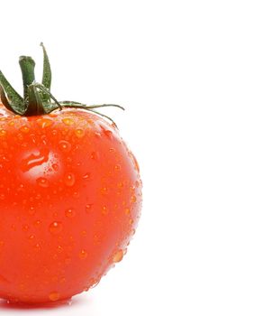 Half of Tomato straight from garden with water droplets isolated on white background