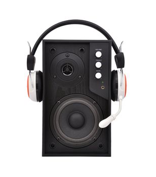 speakers and headphones on a white background