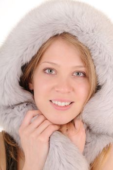 Blonde beauty woman in fur
