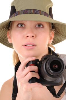 Portrait casual girl-tourist with digital photocamera. Focus on woman's eyes