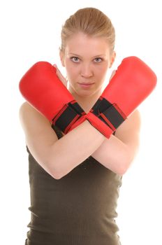 Portrait of a serious girl with red boxing gloves