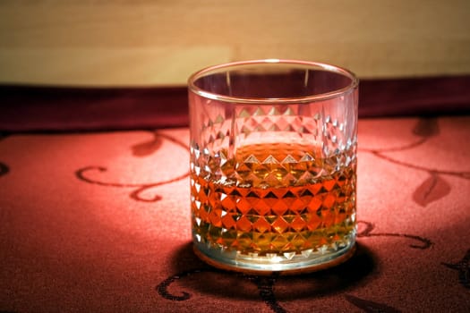 A glass of old whisky on the rocks