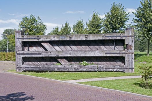 old wooden floodgate on land