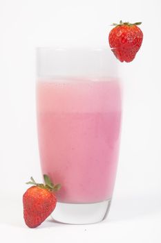 A delicious glass of natural strawberry juice isolated on a white background.