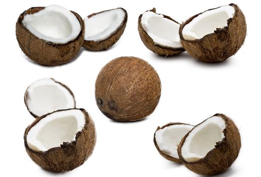 Set of fresh coconuts on white background