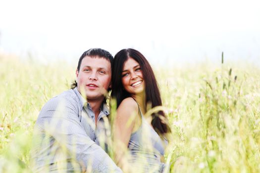 two lovers on grass field