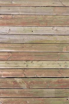 Close up of gray wooden fence panels 