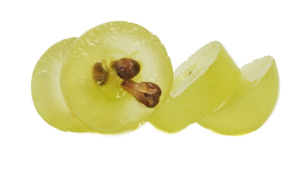 Translucent slice of green grape fruit, macro isolated on white 