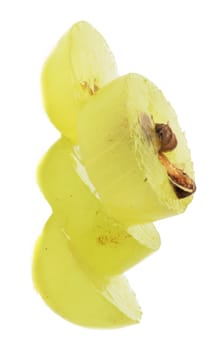 Translucent slice of green grape fruit, macro isolated on white 